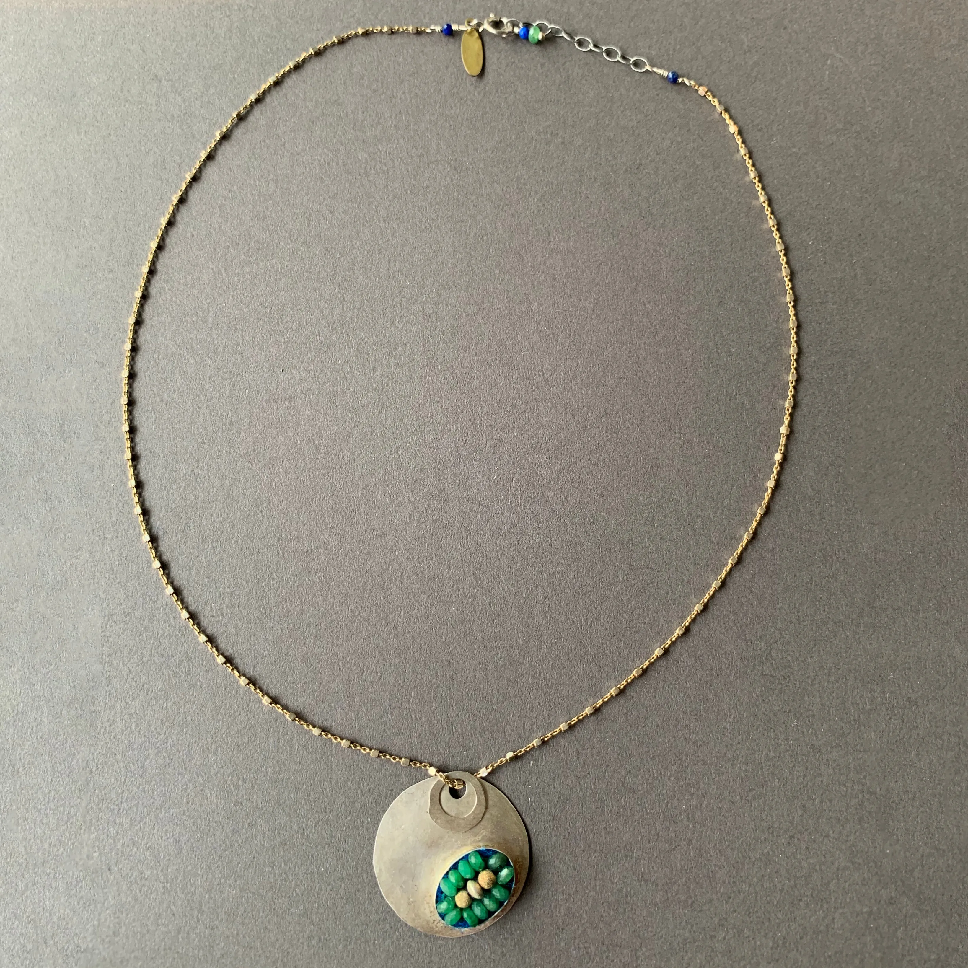 Emerald Mosaic on Hand Hammered Silver necklace