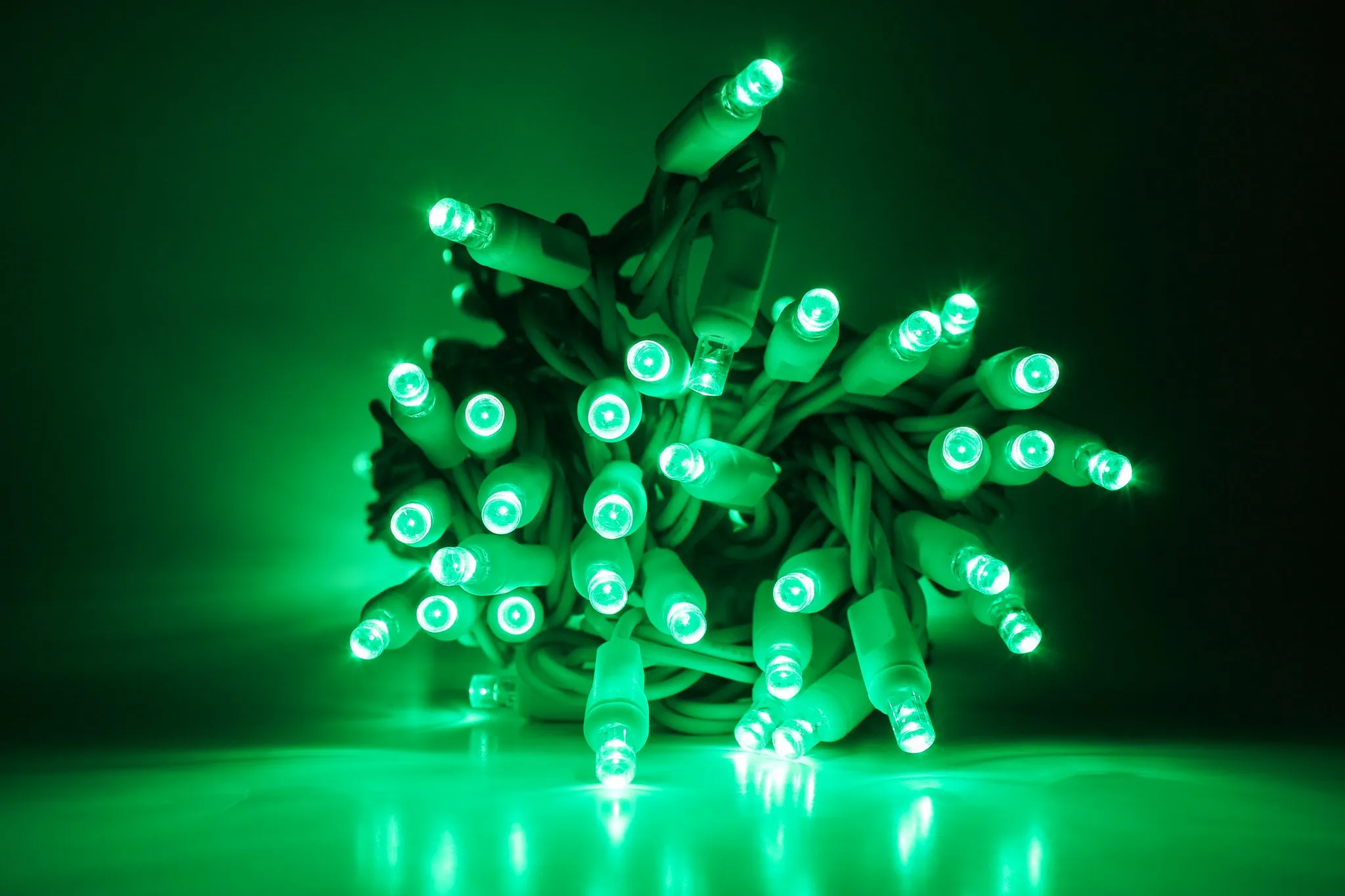 Outdoor LED Lighted Christmas Tree with a White Base and Clear White Tree Lights