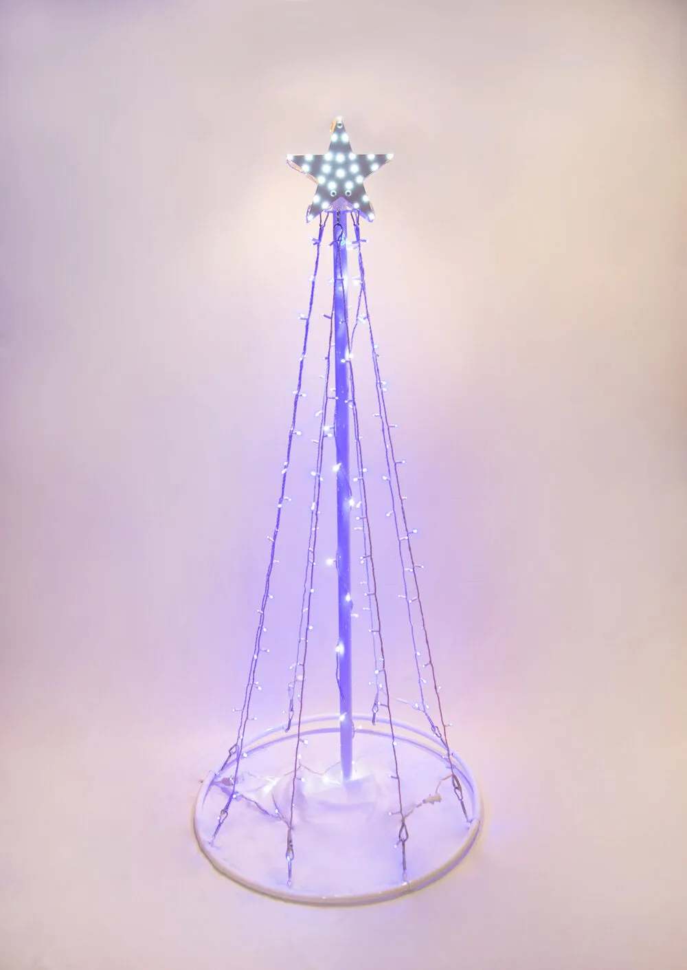 Outdoor LED Lighted Christmas Tree with a White Base and Clear White Tree Lights
