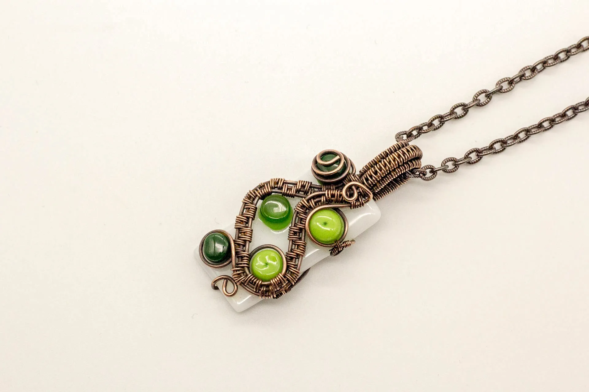 Shades of Green and White Fused Glass Pendant with Copper Wire Wrapping