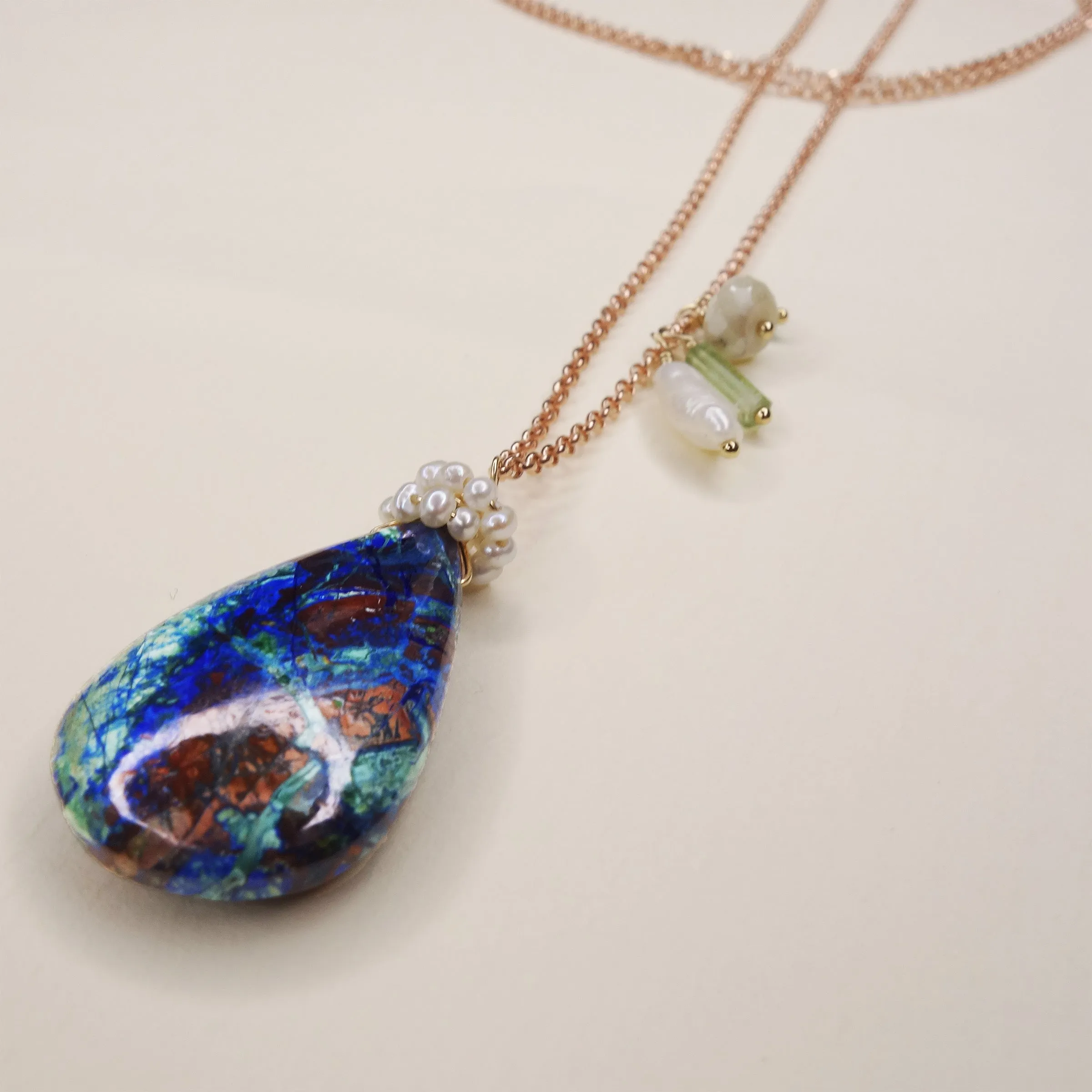 She Realized They Were Oceans Apart: lapis, opal, pearl necklace