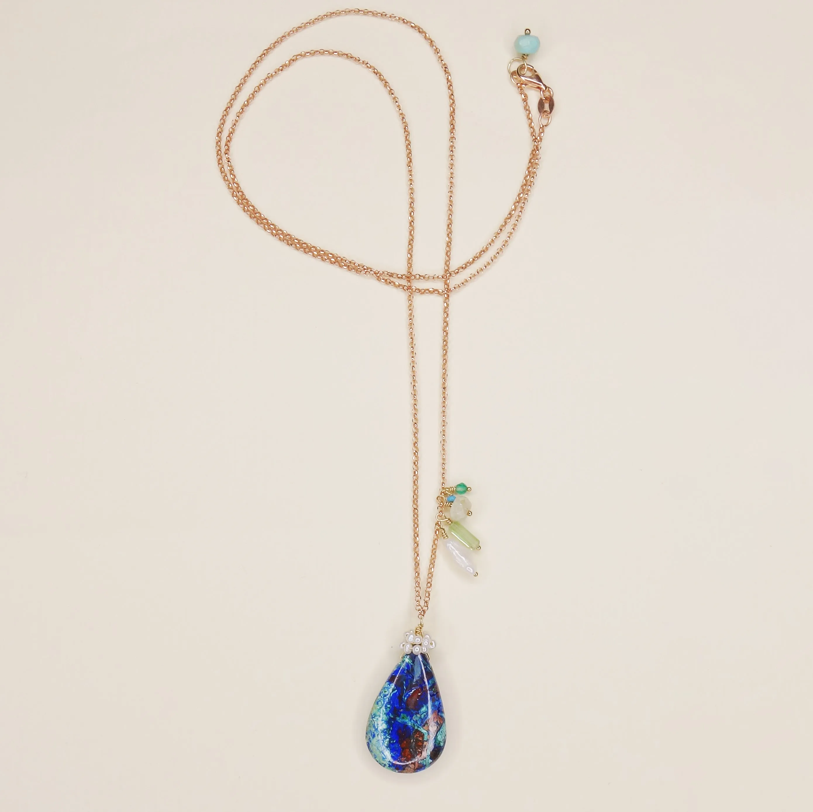 She Realized They Were Oceans Apart: lapis, opal, pearl necklace