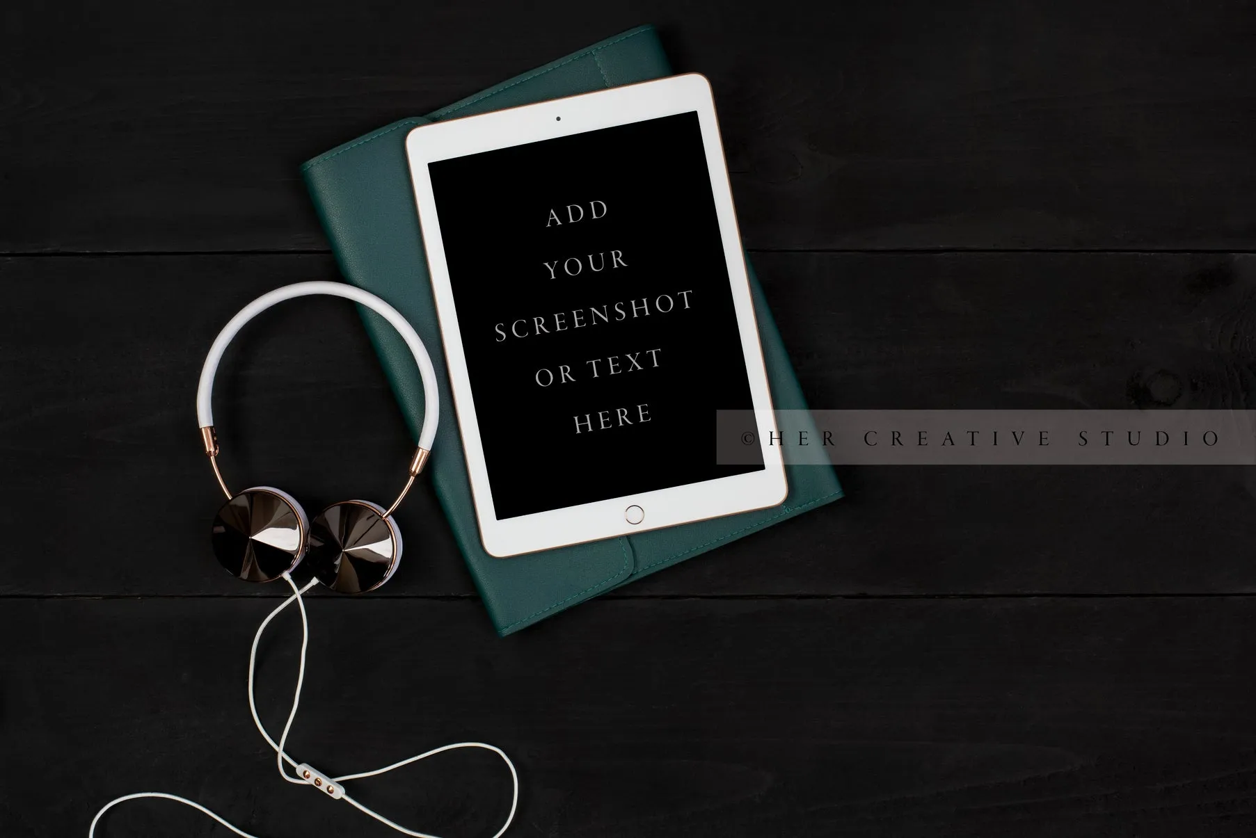 Tablet, Headphones & Notebook on Black Background
