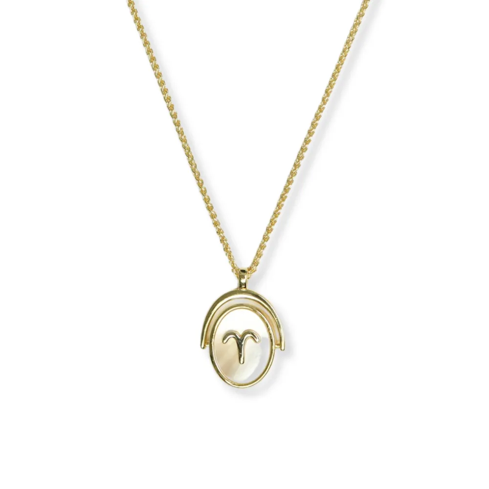 THE ZODIAC SPINNER NECKLACE